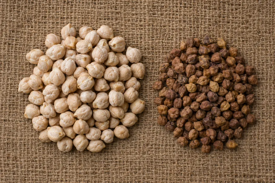 Dried kabuli and desi chickpeas on jute